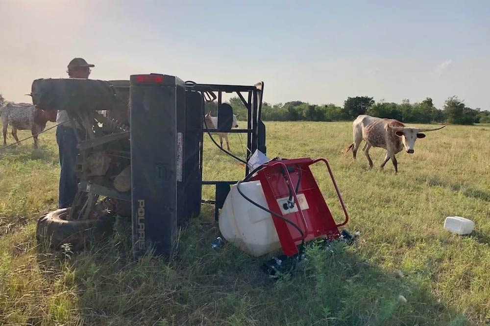 Rolled vehicle in a field